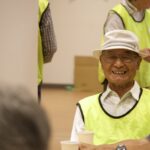 Seniors smiling at an event
